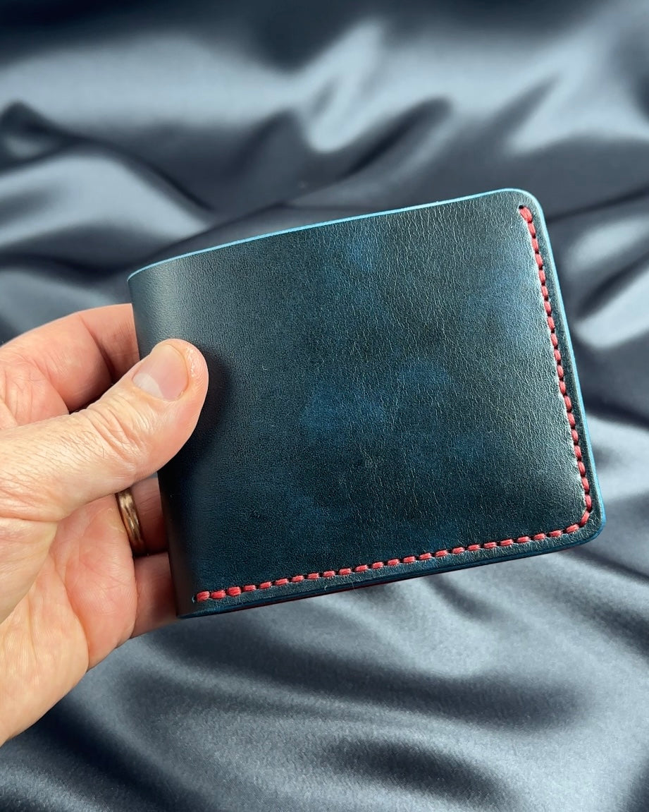 bifold leather wallet in hand URBAN model