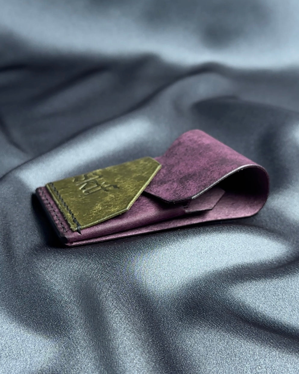 minimalist leather card holder folded construction side view dual color SHIFT model