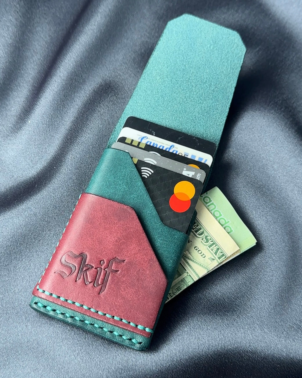 minimalist leather card holder with cards and cash capacity view SHIFT model