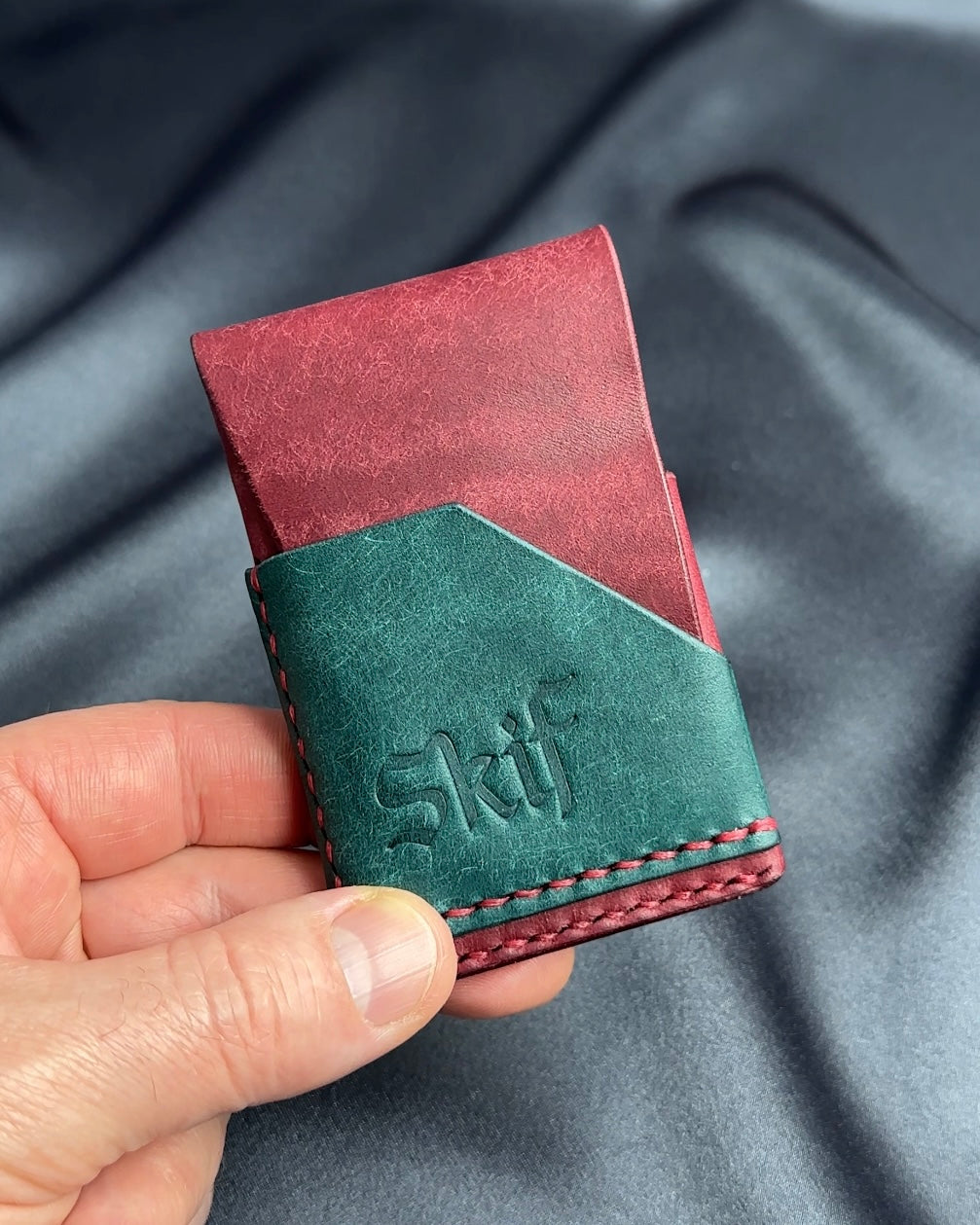 minimalist leather card holder in hand scale view dual color SHIFT model