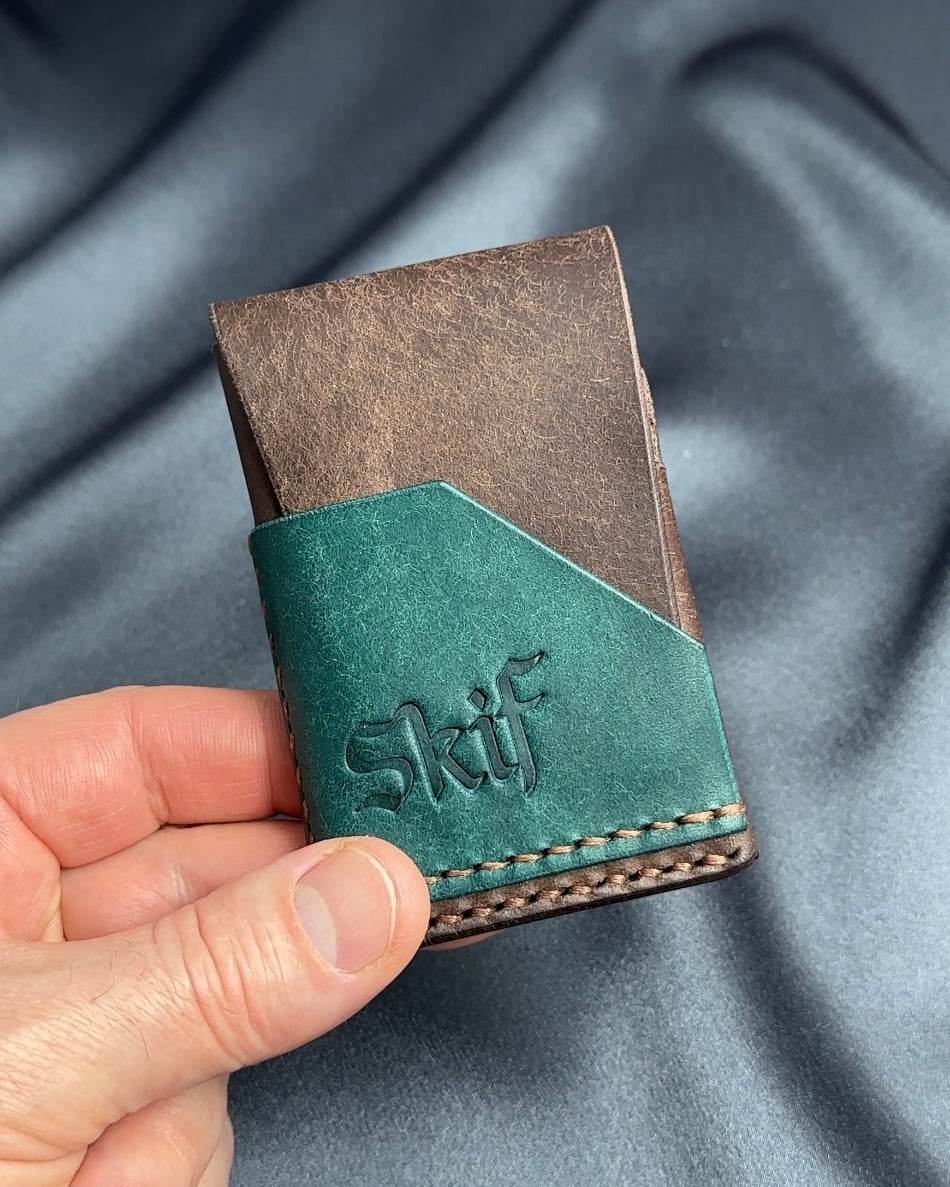minimalist leather card holder in hand scale view dual color SHIFT model