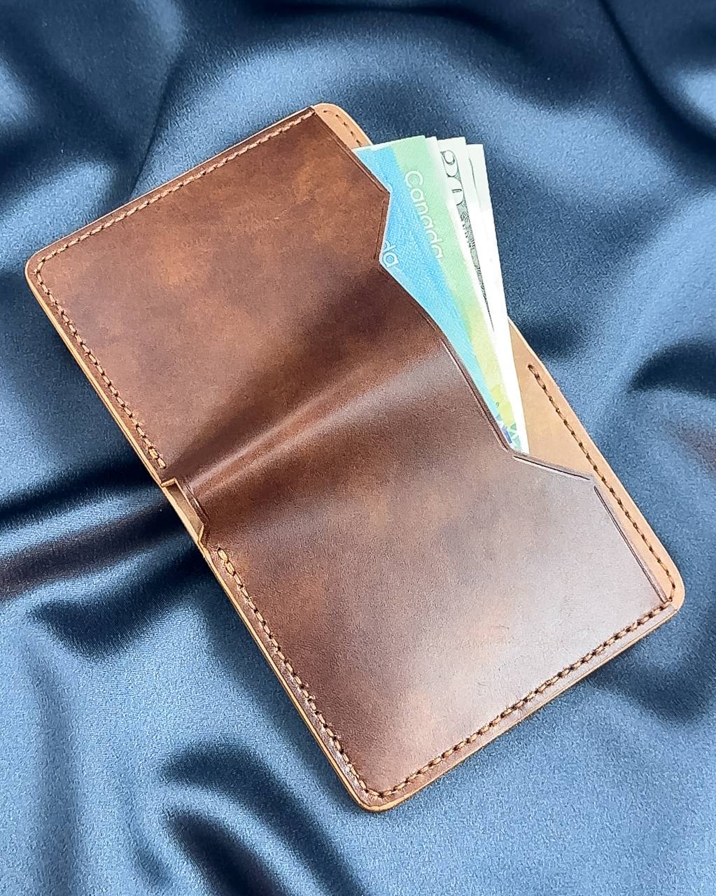 vertical bifold leather wallet open with cash VERTEX model