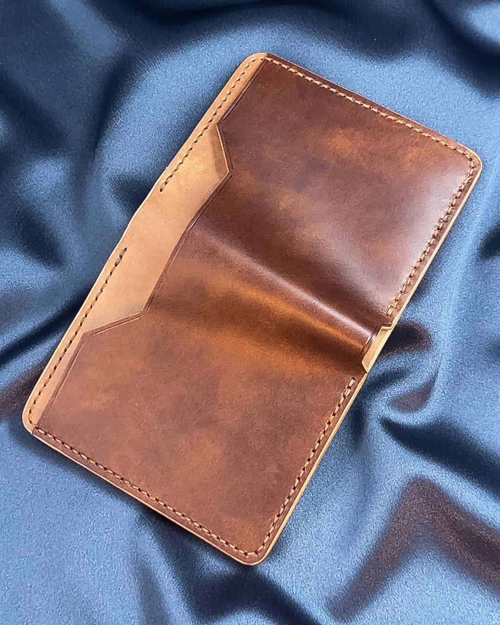 vertical bifold leather wallet exterior open layout VERTEX model