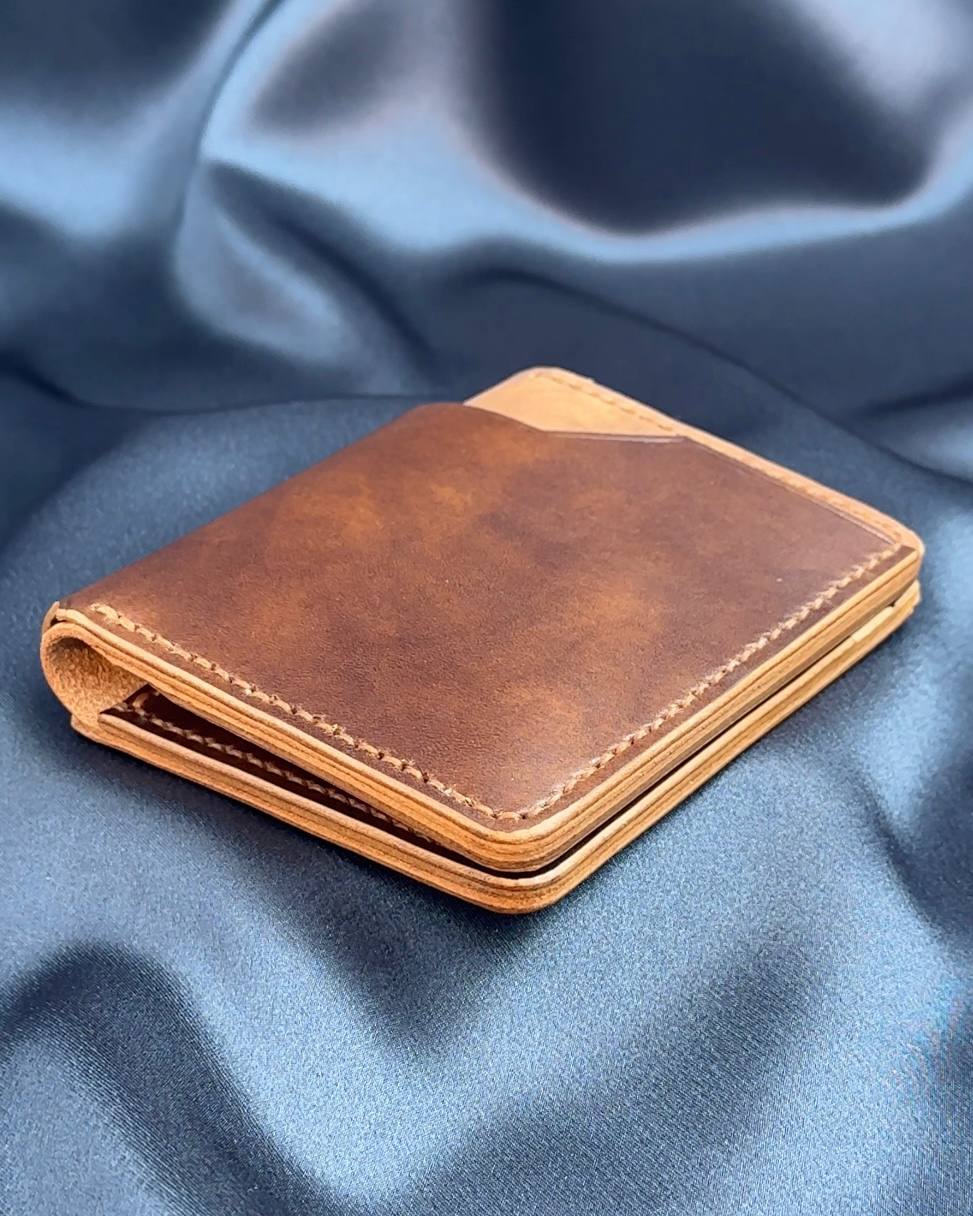 vertical bifold leather wallet closed side profile VERTEX model