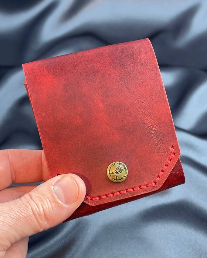 compact leather wallet exterior in hand ATLAS model