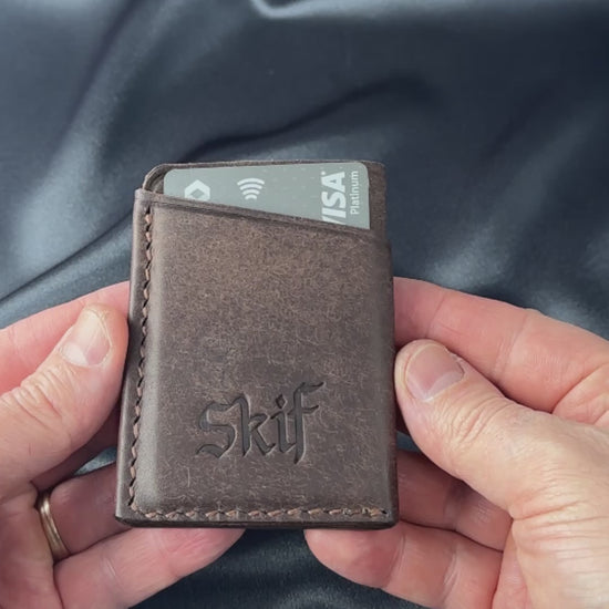 leather card holder in hands usage demonstration SOLO model video