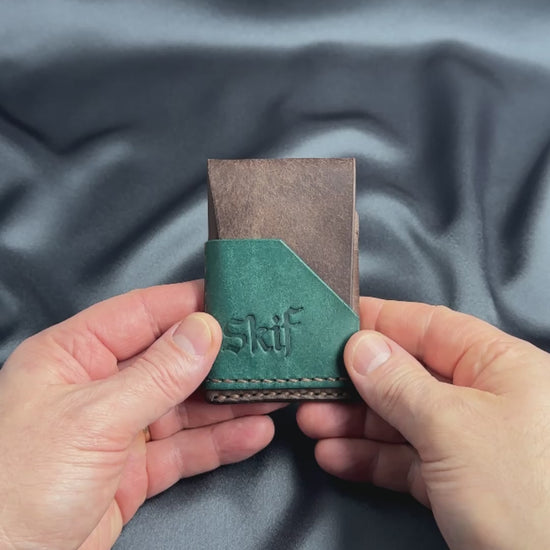 minimalist leather card holder in hands usage view dual color SHIFT model video