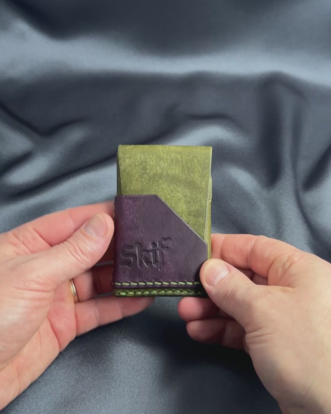 minimalist leather card holder in hands usage view dual color SHIFT model video