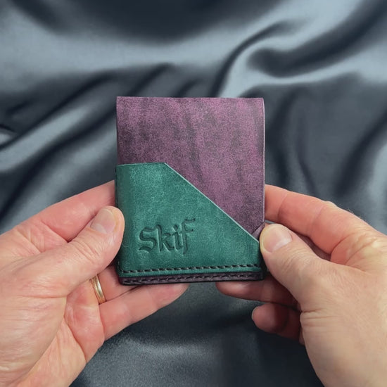 slim snap leather wallet in hands video FUSION model