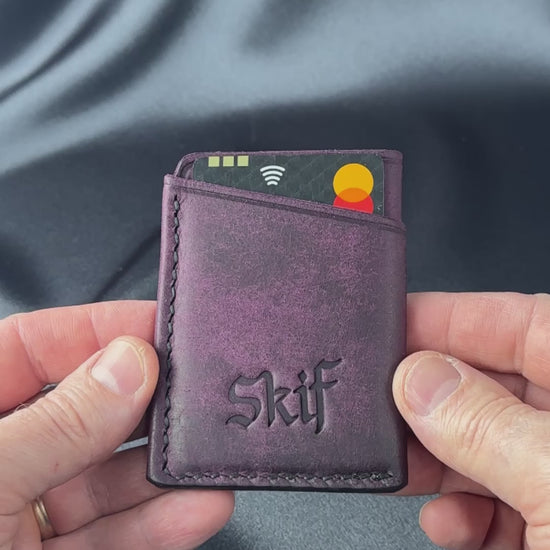 leather card holder in hands usage demonstration SOLO model video